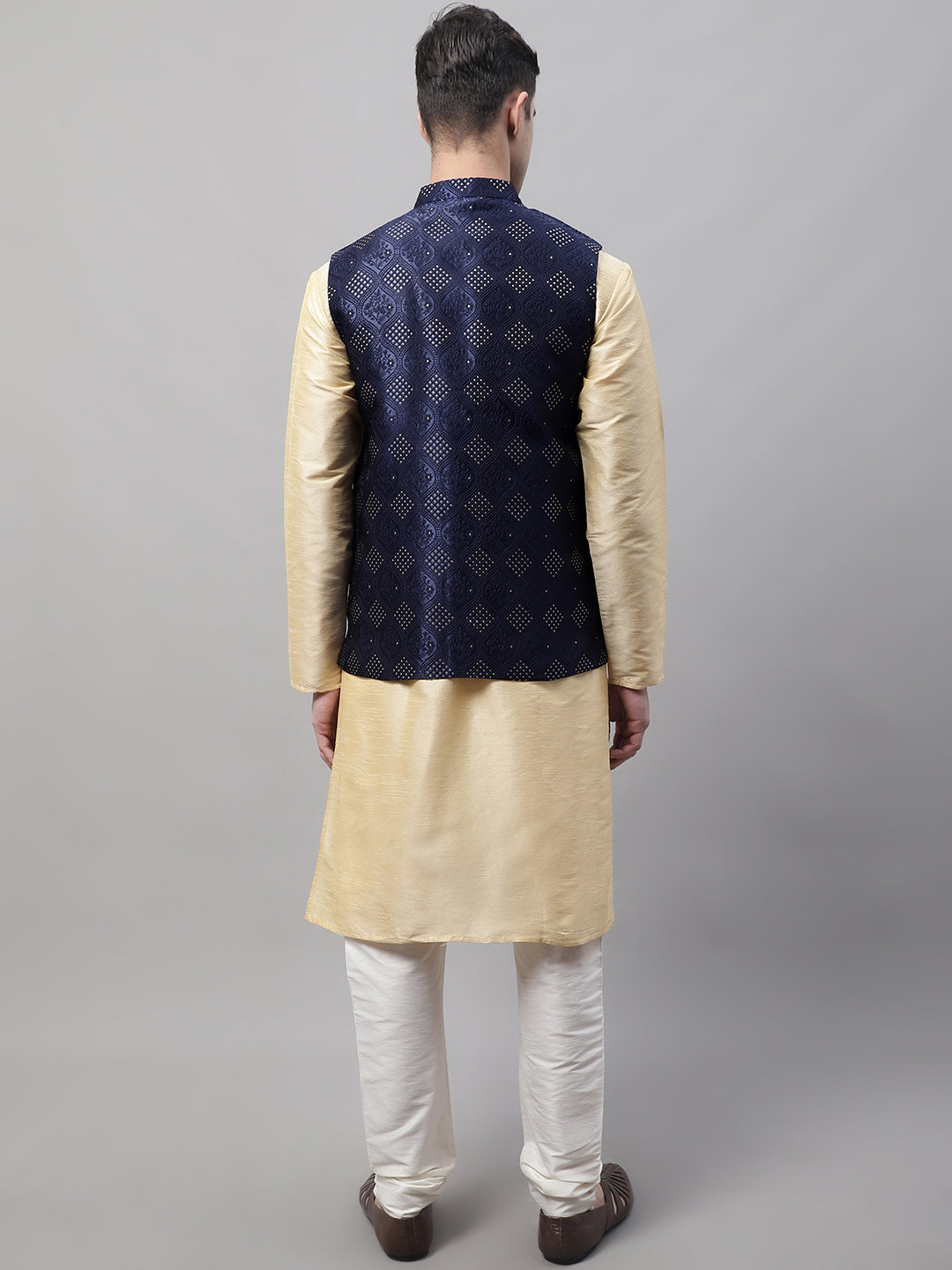 Men Golden Solid Kurta Pyjama with Navy Blue Woven Design Nehru Jacket