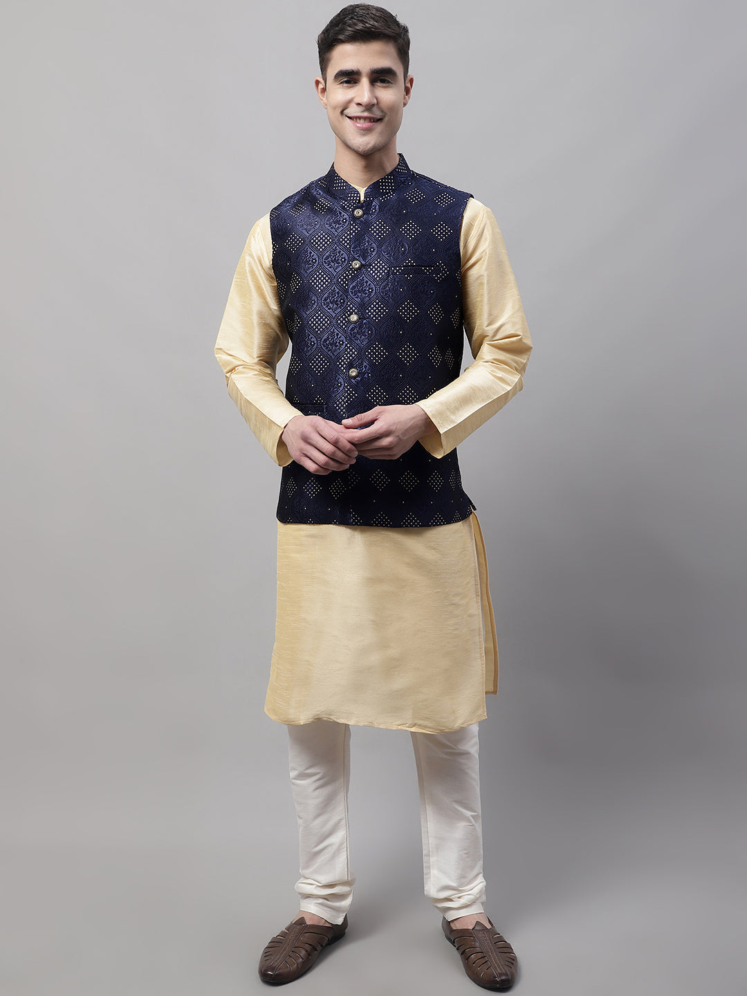 Men Golden Solid Kurta Pyjama with Navy Blue Woven Design Nehru Jacket