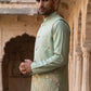 Men Silk Blend Embroidered Nehru Jacket ( 65WC 4181Pista )