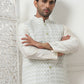 Woven Design Nehru Jacket With Solid Kurta Pyjama ( ANMKPWC 636W 7015Pista )