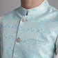 Men's Turquoise Blue Woven Design Nehru Jacket With Solid Kurta Pyjama.