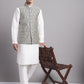 Men's Silver and Black Woven Design Nehru Jacket With Solid Kurta Pyjama.