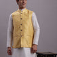 Men's Golden Woven Design Nehru Jacket With Solid Kurta Pyjama.