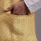 Men's Golden Woven Design Nehru Jacket With Solid Kurta Pyjama.