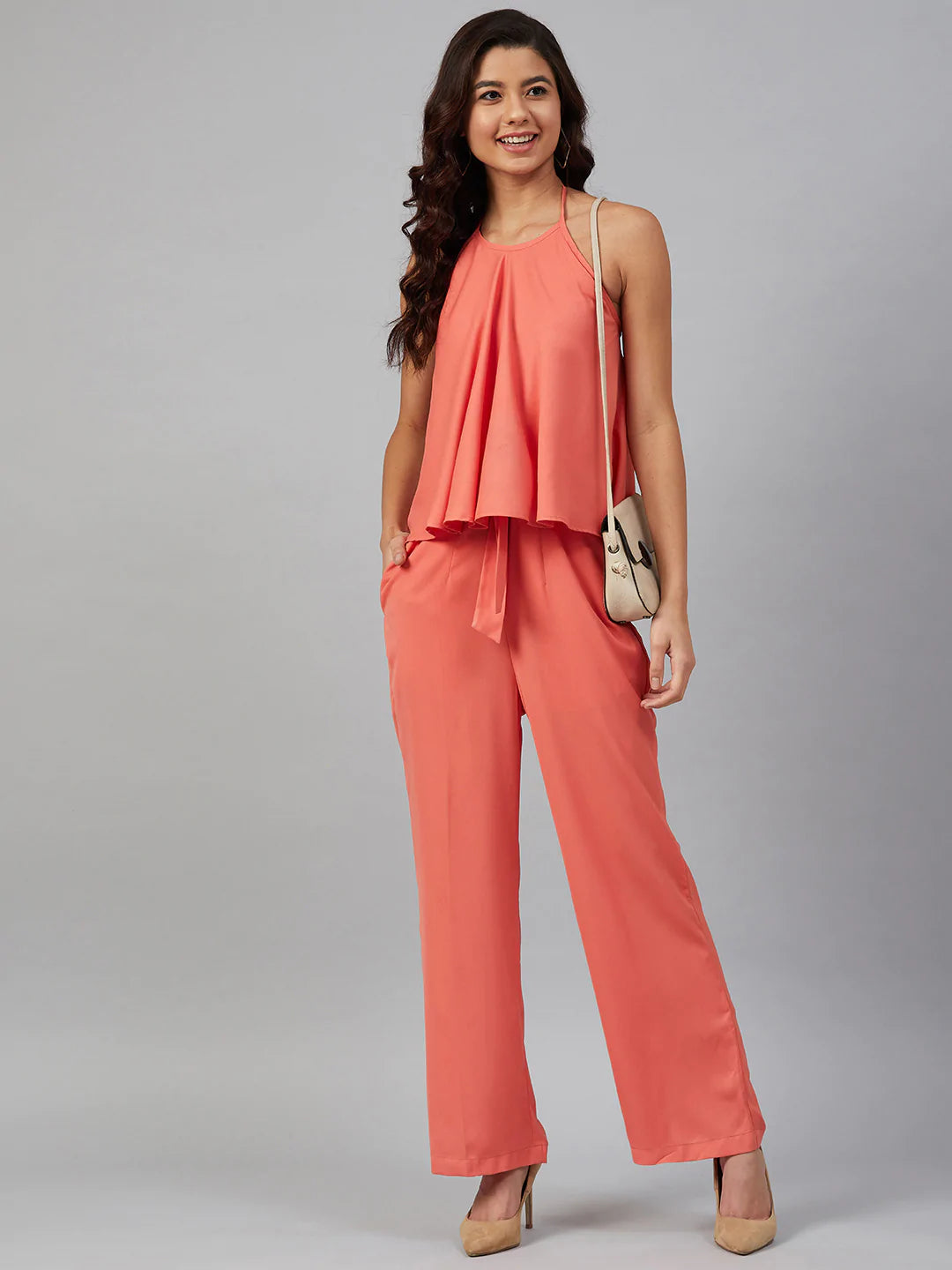 Jompers Women Peach-Coloured Solid Halter Neck Basic Jumpsuit ( JUP 8010 Peach )